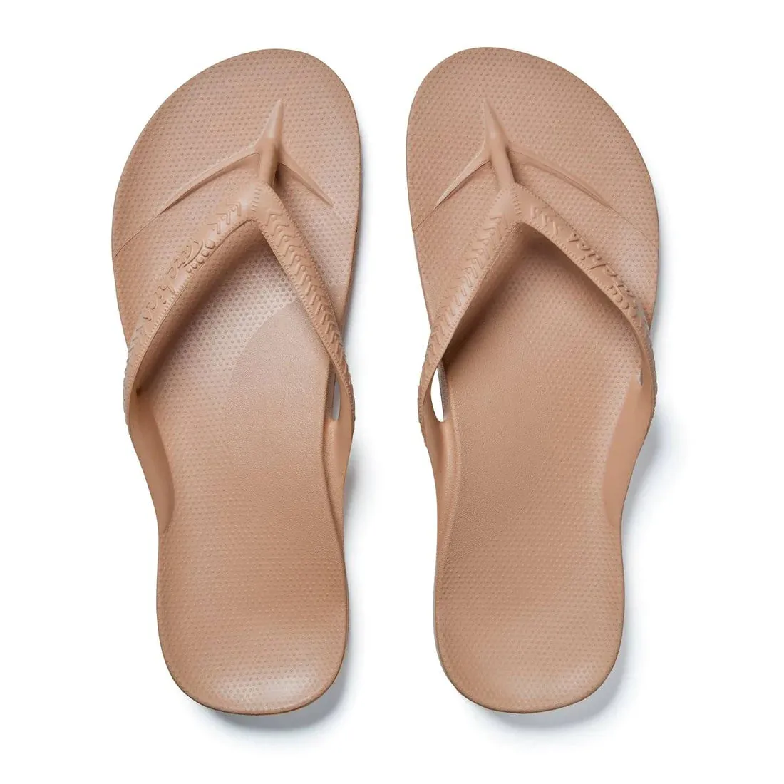 Arch support flip flops in tan