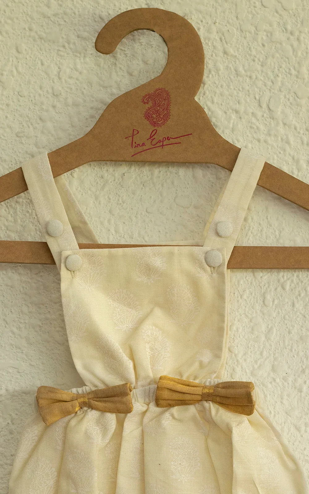 EASY BREEZY HAND BLOCK PRINTED ROMPER IN COTTON KASAVU WITH BOWS AT THE FRONT