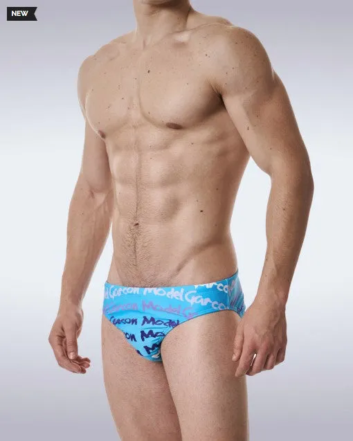 Traje de baño Garcon Model Graffiti Swim Brief mod GM-SWBR-GRAFF-BLU